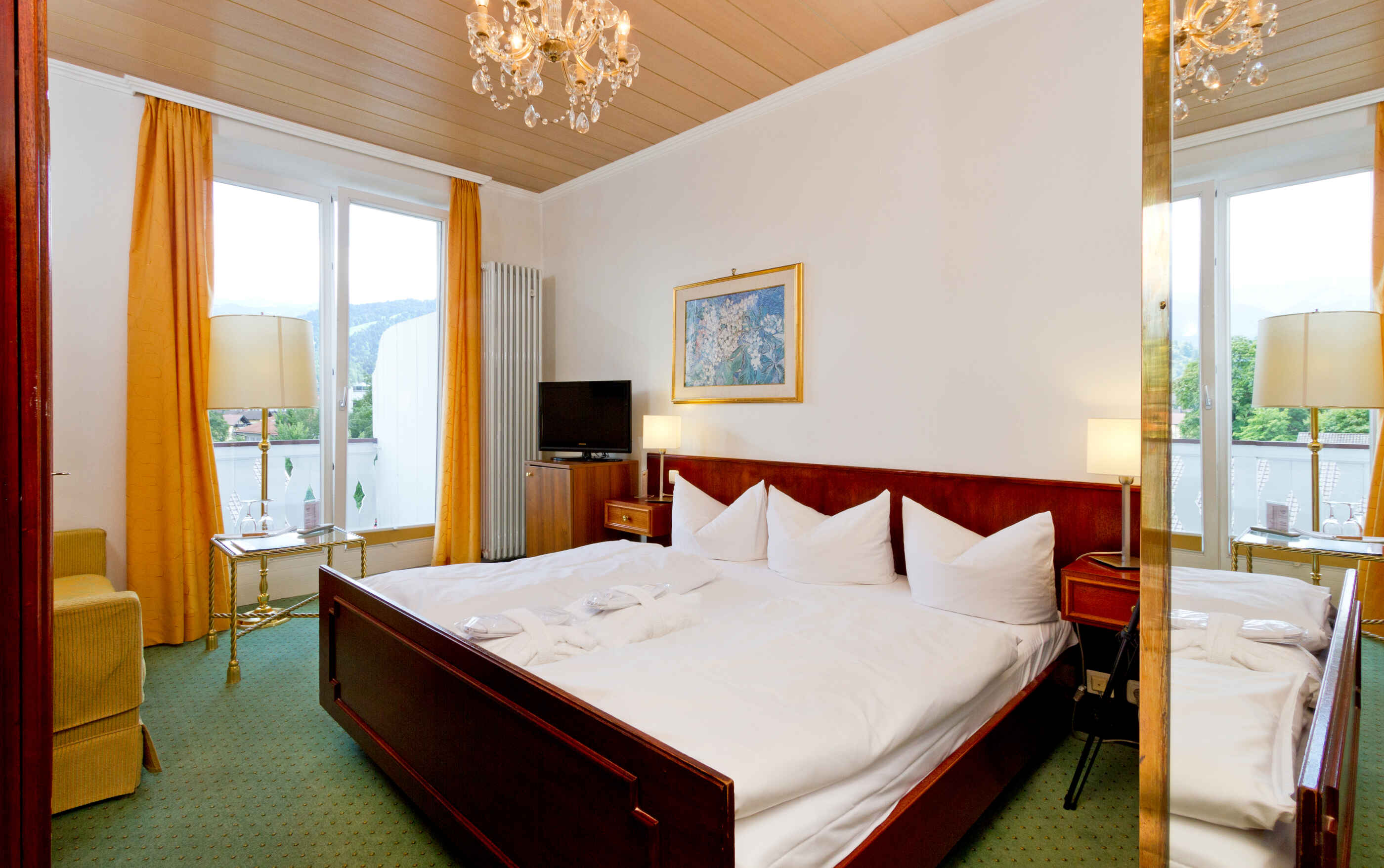 Double room with garden view and balcony