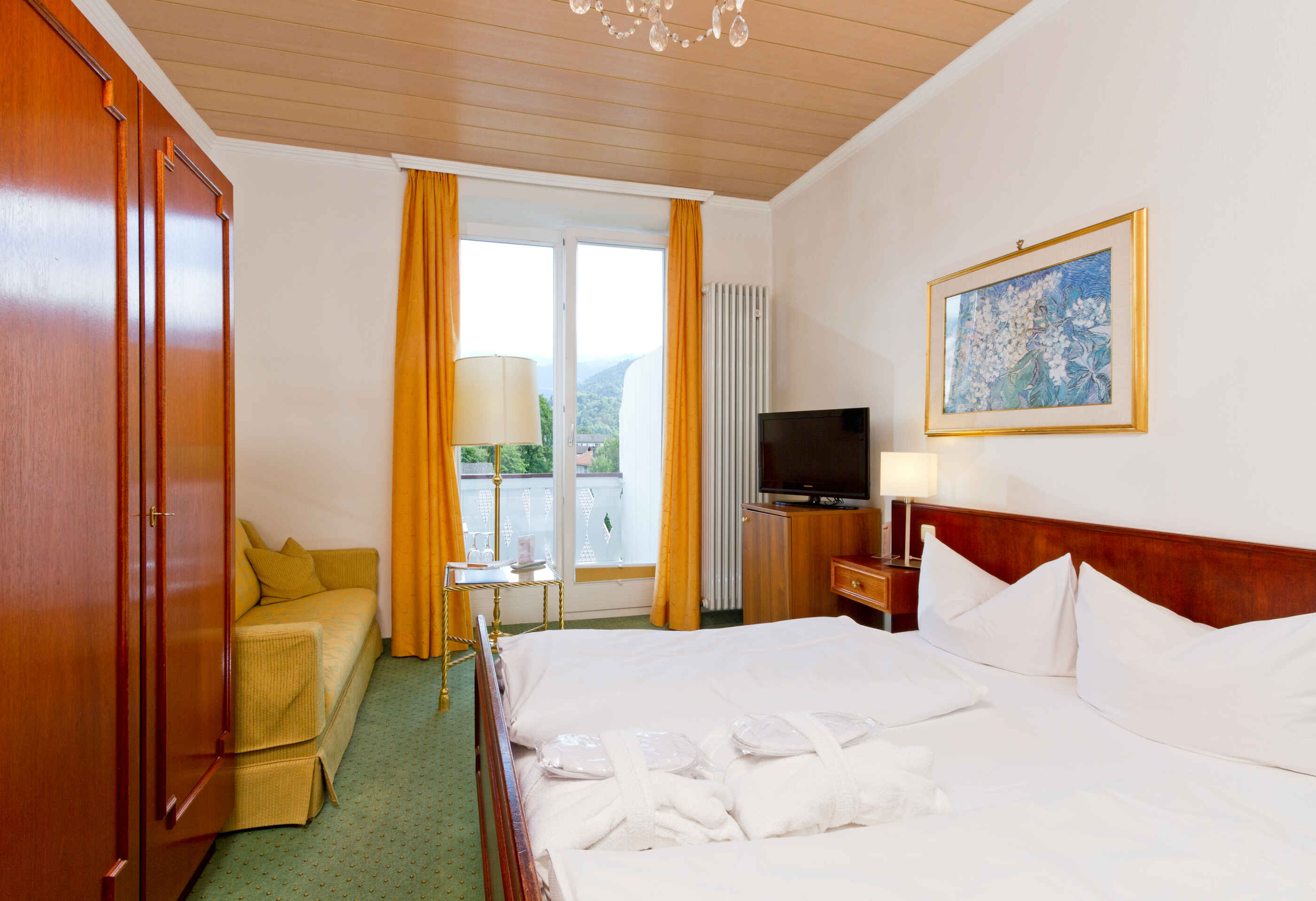 Double room with garden view and balcony