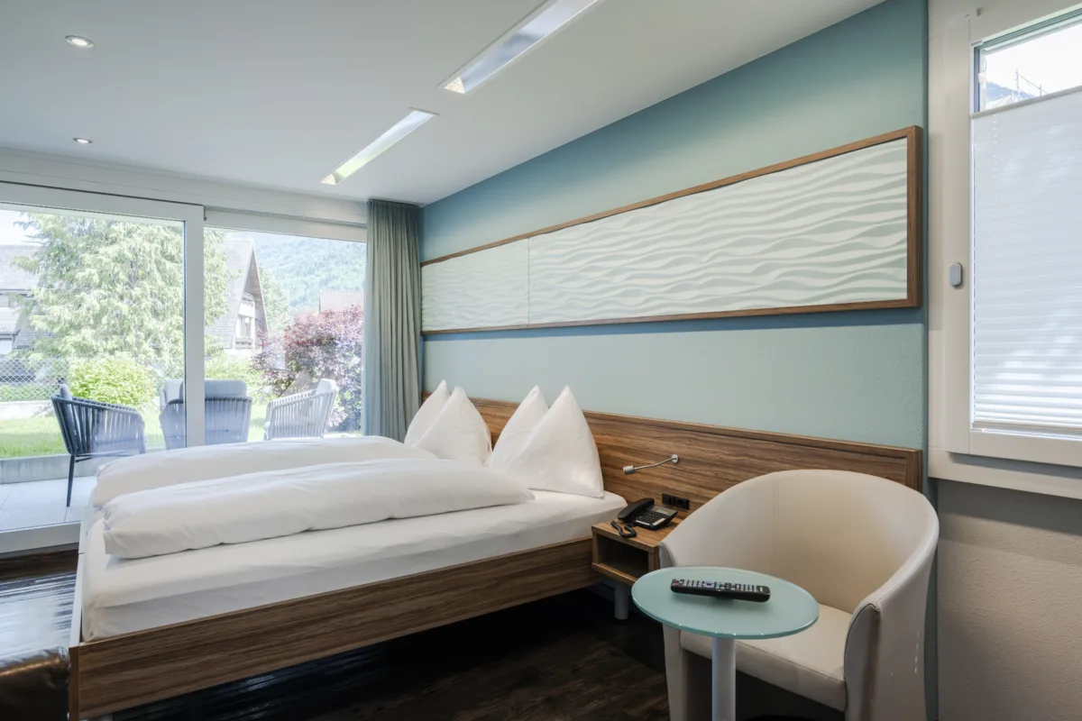 Hotel Nidwaldnerhof: Familienzimmer mit zwei Schlafzimmern und Dorfblick